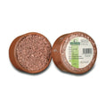 A commercial mineral grit product for pigeons, packaged in a round brown container, with branding and product information visible on the label.