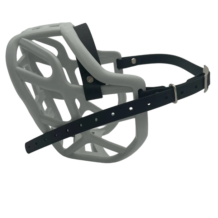 The Muzzle Movement Grey Harry 2.0 dog muzzle with black straps and nickle hardware with chicago screws on a white background