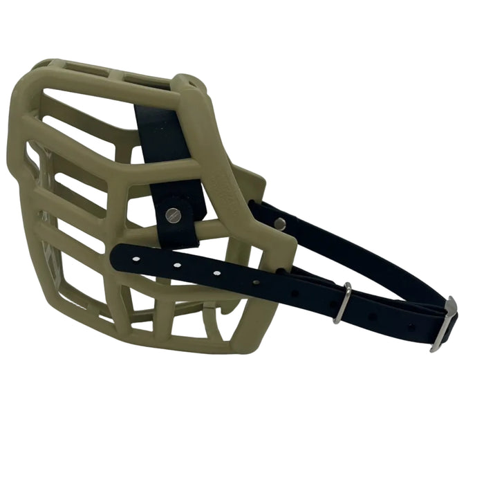 The Muzzle Movement Khaki Neli dog muzzle black straps, nickle hardware and chicago screws on a white background