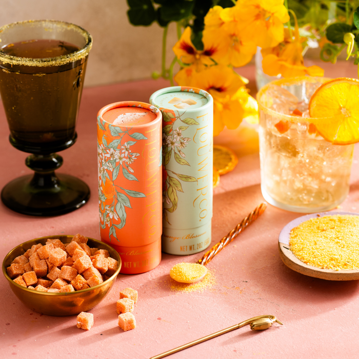 The Orange Blossom Set by Flouwer Co., featuring cocktail cubes and matching floral finishing sugar