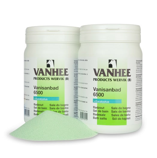 Two containers of VANISANBAD 6500 BATH SALTS with green labeling, indicating they are used for bathing pigeons.